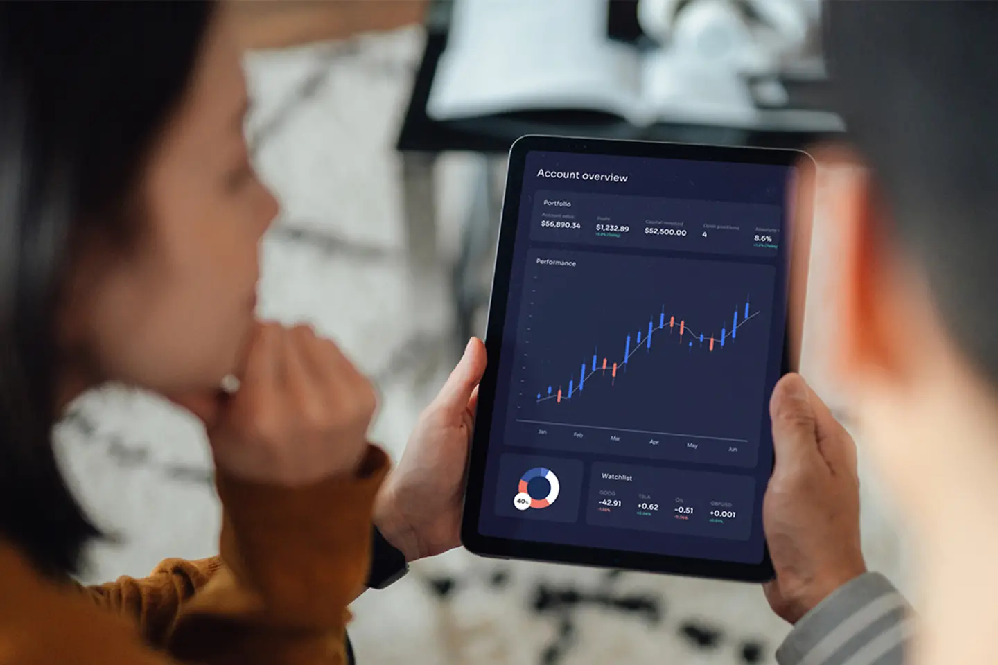 Young couple making financial plans with digital tablet