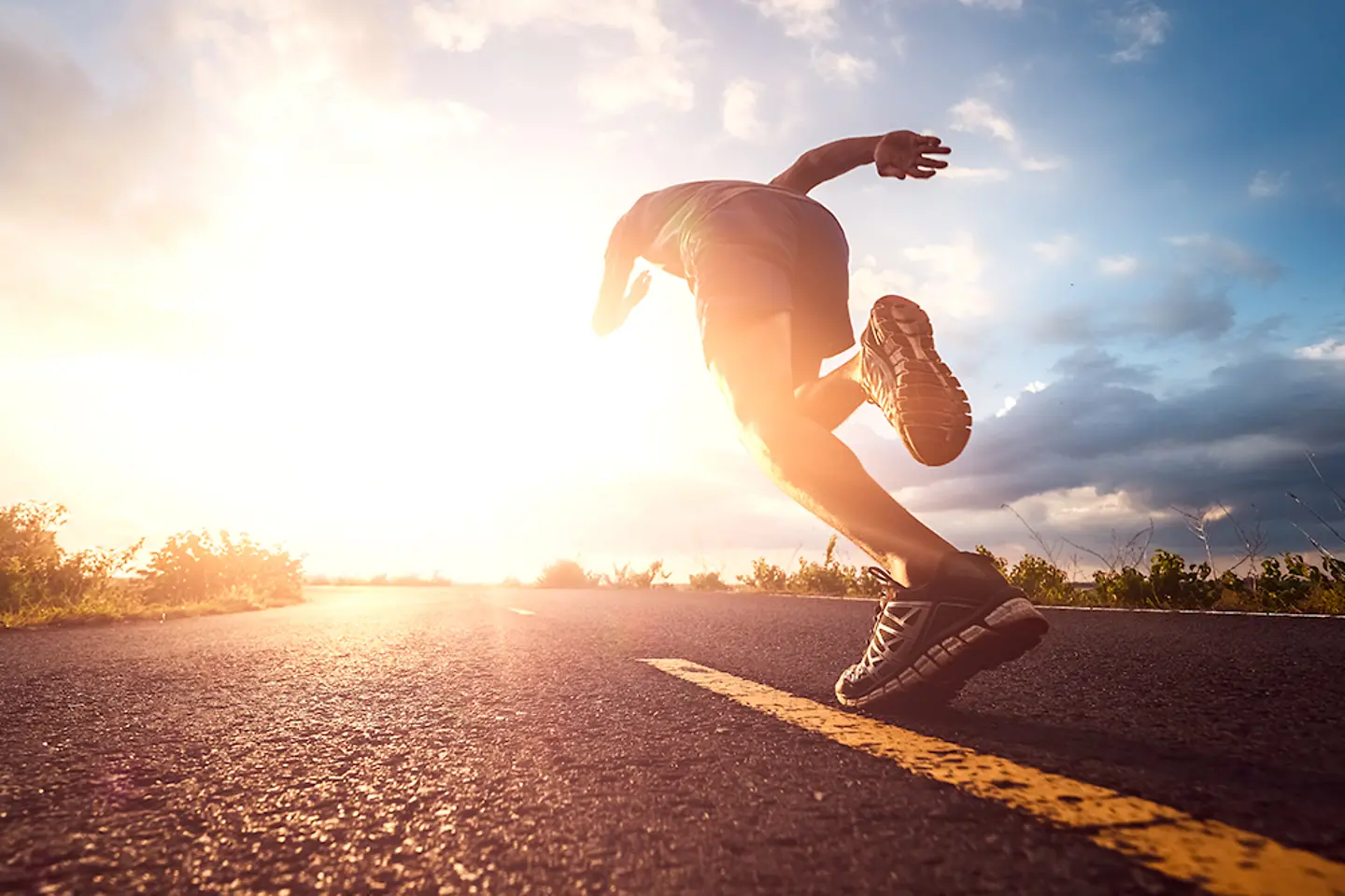 Athlete runner feet running on road, Jogging concept at outdoors