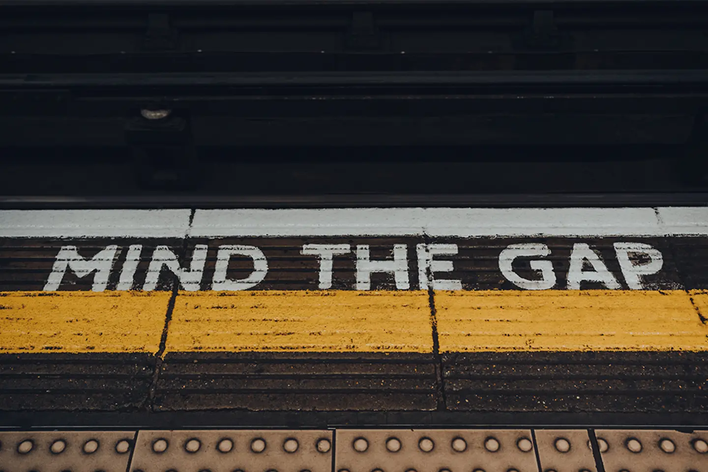 Mind the gap sign on of Moorgate underground station platform of London Underground, UK