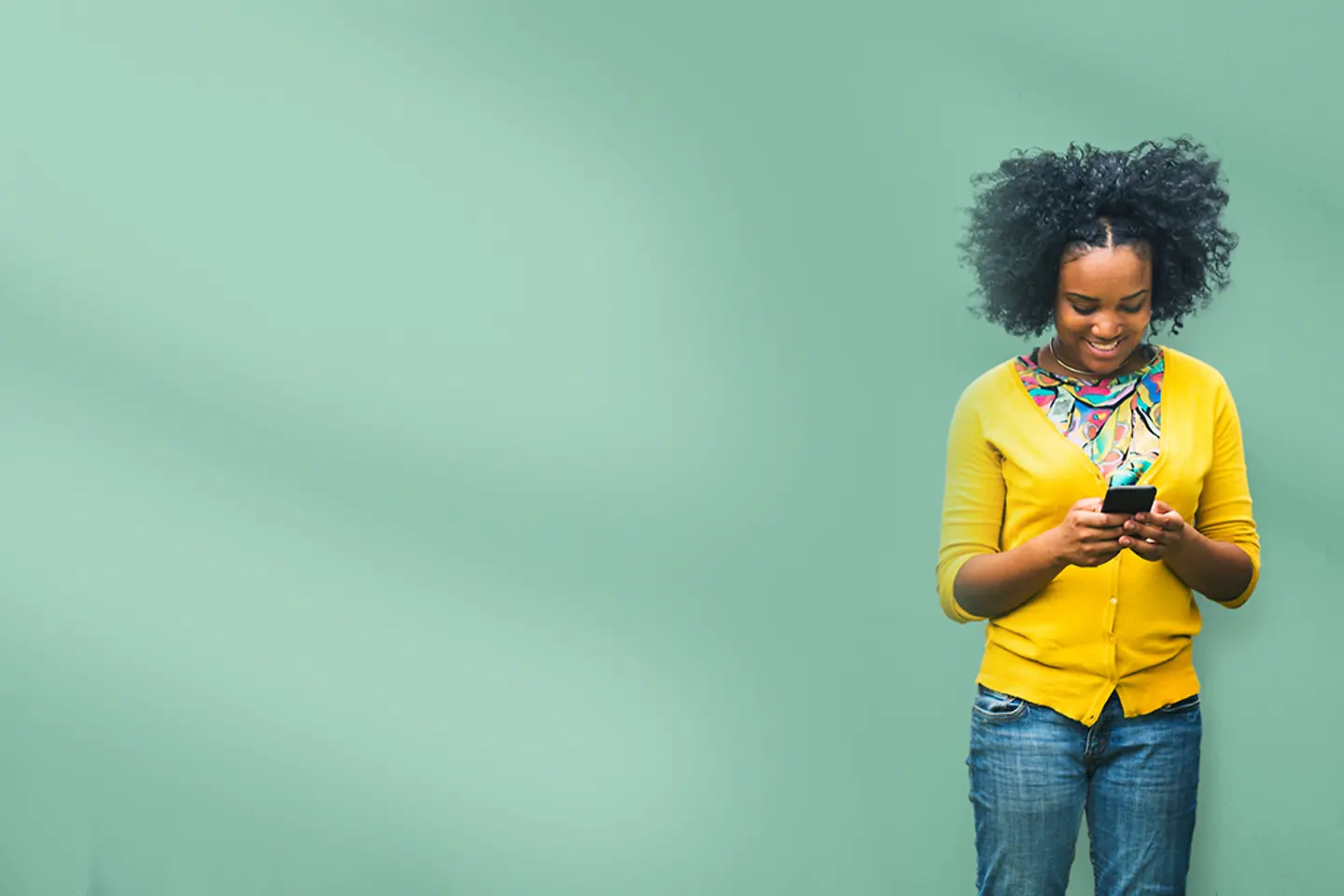 Young people on their phones and tablets