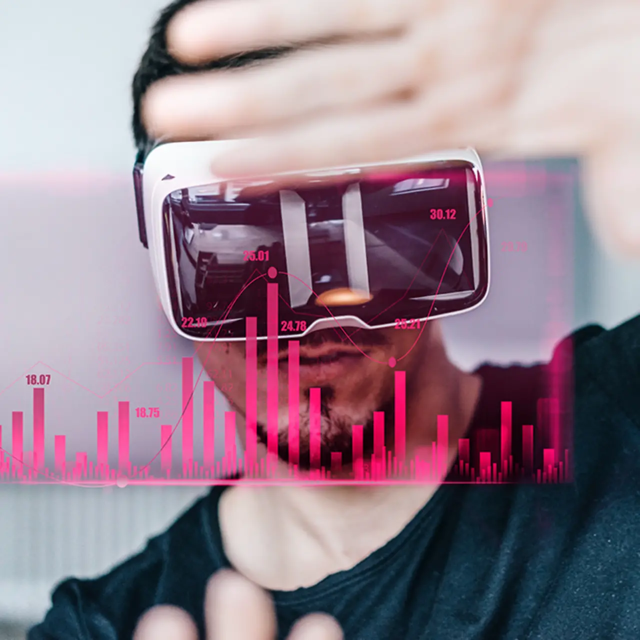 Projection of a magenta diagram in front of a man wearing VR glasses.